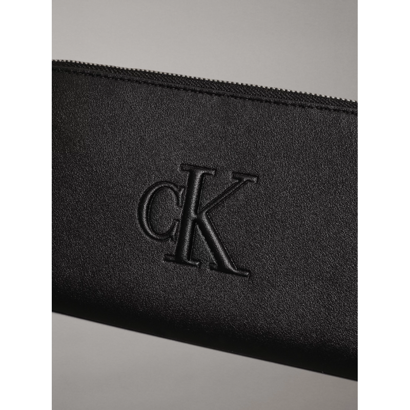 K60K612743 BEH SCULPTED ZIP AROUND DEBOSS
